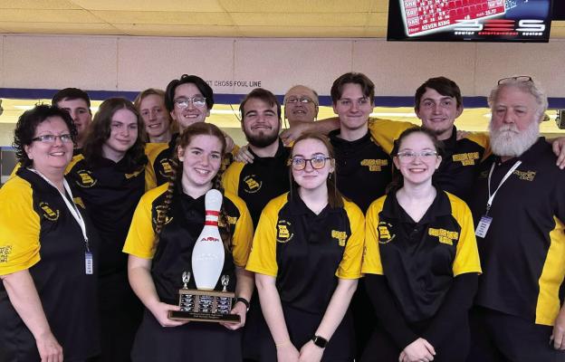 MEMBERS OF the Excelsior Springs High School bowling club display their trophy from December tournament competition at Summit Lanes in Lee’s Summit. From left, front row, coach Teresa Ferrell, Olivia Deere, Olivia Smith, Quinlynn Davis; back row, Kamdyn McAndrews, Brody Hurla, Colt Bowman, Cole Dickey, Joshua Oldham, coach Jerry Ferrell, David Falconer, Andrew DeOrnellis. coach Sam Stanton. SARAH OLDHAM | Submitted