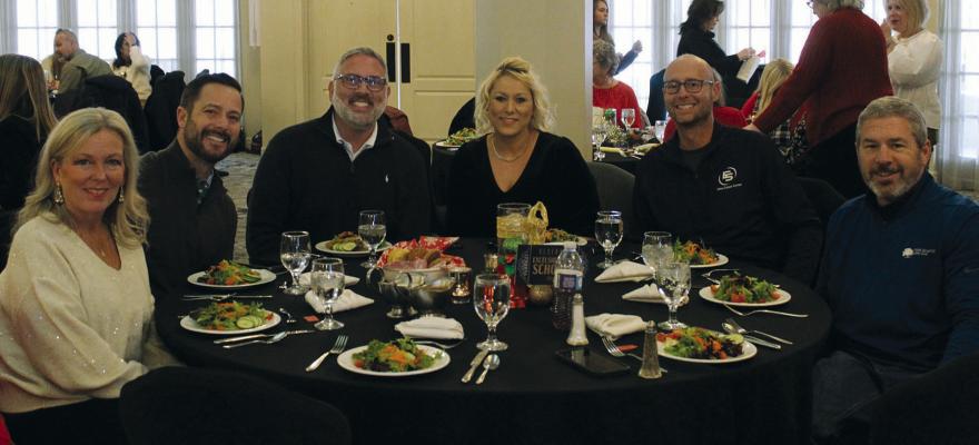 EXCELSIOR SPRINGS SCHOOL District members enjoy the December Excelsior Springs Area Chamber of Commerce Luncheon. MIRANDA JAMISON | Staff