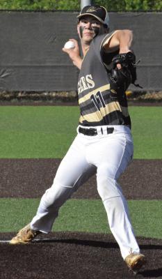 SHAWN RONEY | Staff SENIOR CRUZ LLOYD delivers a pitch for Excelsior Springs against Warrensburg.