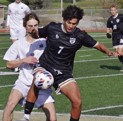 JAKE ZAPATA (center-right), shown fighting for possession, is among the seniors the Tigers will soon graduate. DUSTIN DANNER | Staff