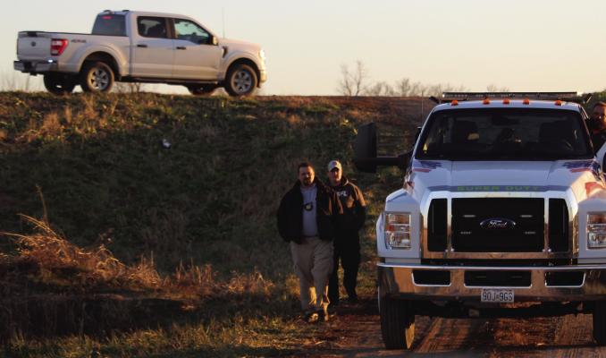 RAY COUNTY Sheriff’s Department Investigators Josh Hamner (left) and Celeste Kaiser clear out the death investigation scene on Pryor Rd. in Ray County. MIRANDA JAMISON | Staff
