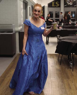 COLEEN DRISKELL arrives at the Silver Prom in a beautiful blue dress and enjoys everything the event has to offer. MIRANDA JAMISON | Staff