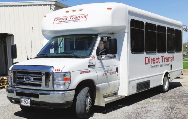HALF-A-DOZEN people in the Direct Transit bus driven by Sid Lewis are in line for food at the Salvation Army Family Store in Richmond. J.C. VENTIMIGLIA | Staff