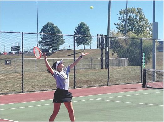 ANNA SELBY serves during the Class 1 District 14 singles championship match Sept. 29 at Excelsior Springs. Selby wins the title, putting her in this week’s sectional competition. DUSTIN DANNER | Staff