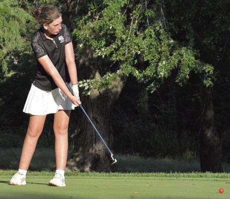 ALLISON DEERE watches her putt during Excelsior Springs’ road quadrangular with Richmond, Lawson and Norborne. SHAWN RONEY | Staff
