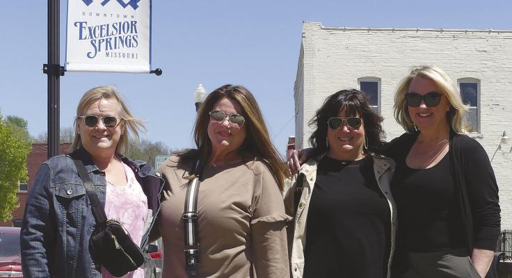 Good weather brings Patty Hass (from left), Melissa Downy, Kim Shaw and Kate Russel to take in Gatsby Days.