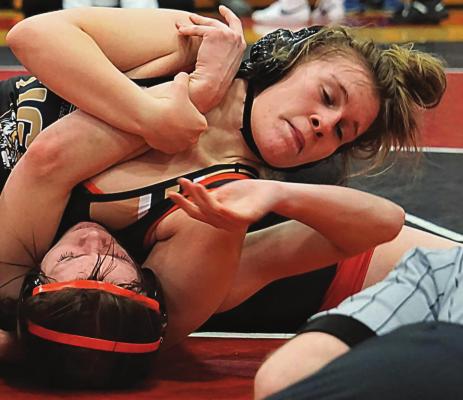 EXCELSIOR SPRINGS senior Jacey Brewer, seen picking up a win by fall earlier this season, is headed to the girls state wrestling tournament next weekend at Mizzou Arena in Columbia. DUSTIN DANNER | Staff