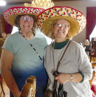 PANDORA JONES and Sherlyen Dell dressed up for the festivities wearing sombreros.