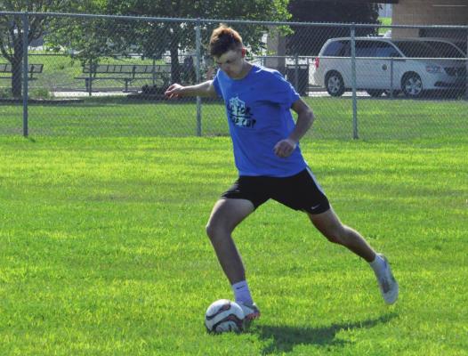 ESHS SENIOR Ethan Edwards makes footgolf look like a fun sport to play. SHAWN RONEY | Staff