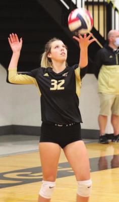 BAYLEE O’DELL prepares to serve in volleyball, one of two high school sports she plays at Excelsior Springs. DUSTIN DANNER | Staff