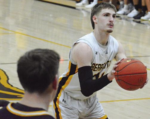 LUCAS WALKER (right) studies the rim as he attempts a free throw during Orrick’s varsity boys basketball meeting with La Monte. The Orrick boys cruised to a 56-18 home win. The varsity girls fell to La Monte 32-11. The next night, both Orrick varsity squads fell to Carrollton to start a three-game road swing. SHAWN RONEY | Staff