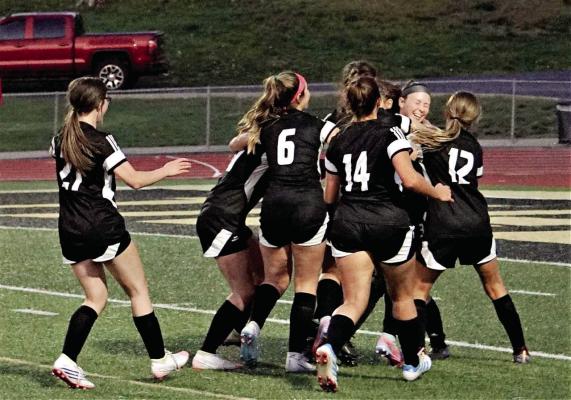 THE TIGERS celebrate after their April 17 home shootout victory over Savannah. TIM HARLAN | Submitted