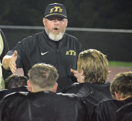 EXCELSIOR SPRINGS varsity football coach Jake Danneman, shown talking to his players after this year’s Black and Gold Scrimmage, seeks to build the Tigers into a team on the upswing that will give opponents a fight all game long. SHAWN RONEY | Staff