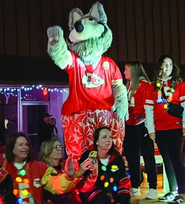 THE KC WOLF waves to the crowd from Reece Nichols’ float. MIRANDA JAMISON | Staff