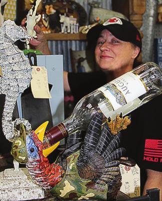 AT THE WILD BUNCH craft mall, 1218 N. Jesse James Road, vendor Crissy Brayfield shows off items in one of her two booths.