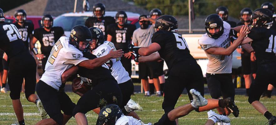 THE TIGERS, seen here playing in August at Savannah, grind through an uncertain, COVID-era football season. DUSTIN DANNER | Staff