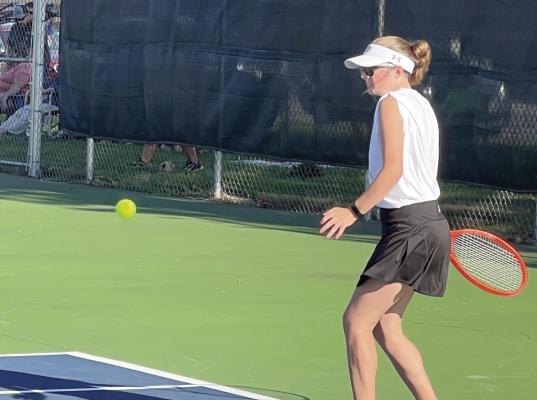 DUSTIN DANNER | Staff EXCELSIOR SPRINGS senior Anna Selby hits a forehand shot in varsity girls tennis action last week en route to picking up a win in the No. 1 singles spot.