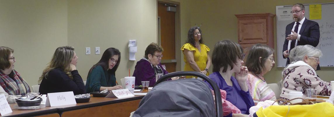 EXCELSIOR SPRINGS SAFE coalition members listen intently to Regina Funk, treatment court manager, and Clay County Prosecuting Attorney Zachary Thompson as they explain what treatment courts are and the opportunities associated with them for nonviolent offenders. ELIZABETH BARNT | Staff