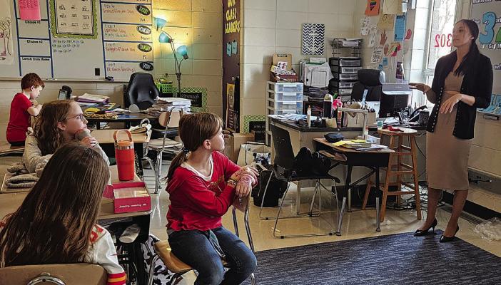 EXCELSIOR SPRINGS Standard reporter Miranda Jamison presents a guide to interviewing for Kearney Newspaper Club last week. CHELSEA MILLER | Submitted