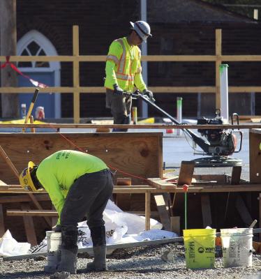 CREWS WORK on different stages of the process. MIRANDA JAMISON | Staff