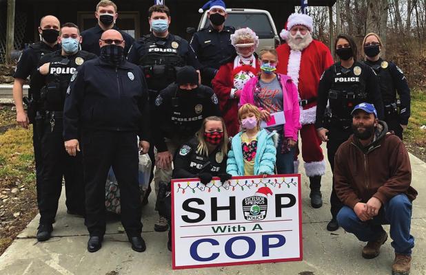 EXCELSIOR SPRINGS Police Department members and friends provide Christmas gifts to families across the community.