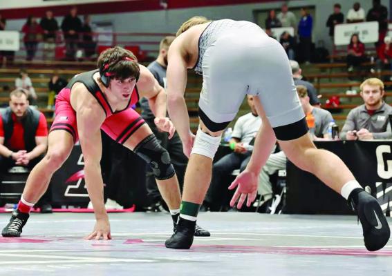 DAMON ASHWORTH (left), an Excelsior Springs High School graduate, continues to win wrestling titles at the University of Central Missouri. ERICK VARGAS | Courtesy of UCM Athletics