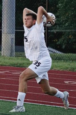 EASTON RYAN makes a throw-in for Excelsior Springs during a recent win over Winnetonka. DUSTIN DANNER | Staff