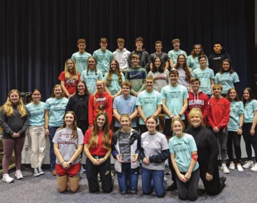 LAWSON’S Cardinals in Action school group receives the Champions for Change award.