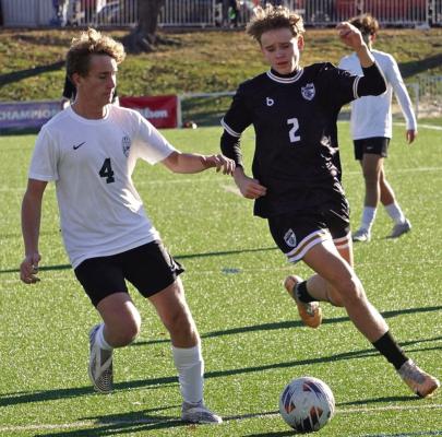 BRADY SCHOONOVER (No. 2) fights for possession Nov. 18 against Orchard Farm at Fenton. TIM HARLAN | Submitted