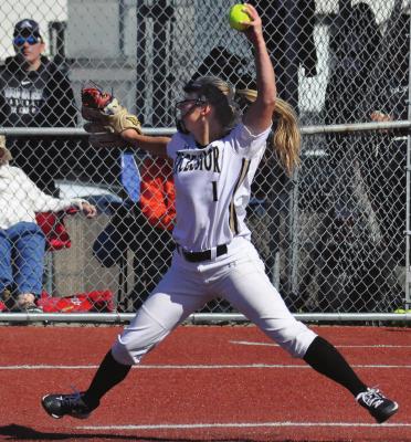SOPHOMORE PITCHER Bailey Carder is lifted off the turf as she delivers in the bottom of the third inning of Excelsior Springs’ Oct. 16 Class 4 District 8 title showdown with Platte County at Miracle Field. SHAWN RONEY | Staff
