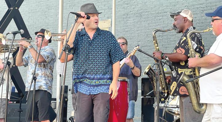 FOUR FRIED CHICKENS and a Coke perform in June on Waterfest’s main stage. The festival drew 8,383 visitors to Excelsior’s downtown June 24 and 25, data from Placer Labs Inc. has shown. Every event in the downtown area has drawn at least 1,000 people per visit, Placer data reveals. BRIAN RICE | Staff