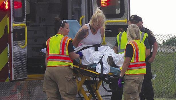 Alleged suspect Taylor D. Shoe was transported for medical treatment by Liberty Fire Department following pursuit of a stolen vehicle. See story on Page 2. MIRANDA JAMISON | Staff