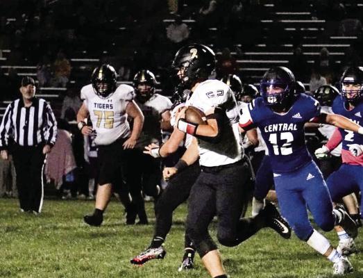 EXCELSIOR SPRINGS quarterback Chance Moreland outruns some wouldbe St. Joseph Central tacklers and piles up the yards Oct. 7 on the road. TIM HARLAN | Submitted