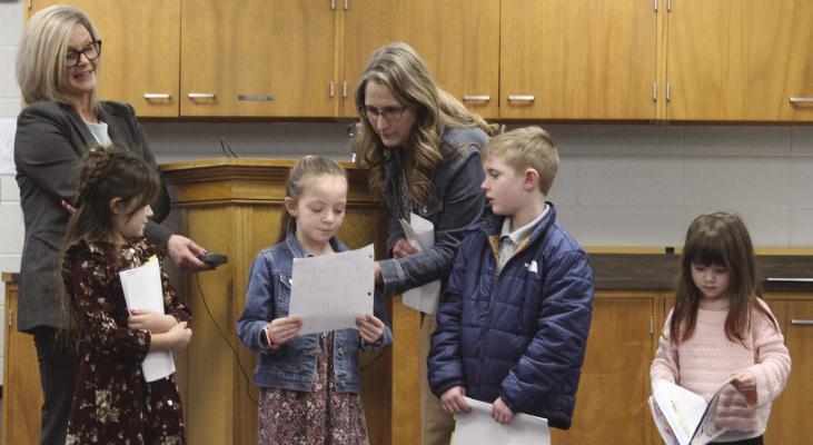 ELKHORN ELEMENTARY STUDENTS read their articles aloud during a school board meeting as staff members share details about classroom writing work. MIRANDA JAMISON | Staff