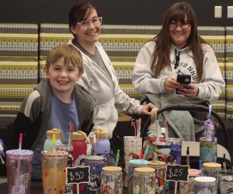 JENSEN POLLEY (from left), Adrianne White and Delise Fisher with Nerd on Craft Street, participated as vendors in Holly Days at ESHS. MIRANDA JAMISON | Staff