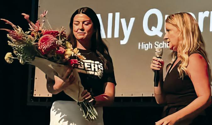 ASSISTANT SUPERINTENDENT Dr. Melissa Miller (right) presents Ally Querry with the 2025 Hope Award during the Excelsior Springs School District Convocation. Submitted