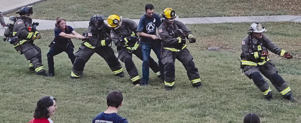 THE EXCELSIOR SPRINGS Fire Department gives it all they’ve got during the tug-of-war competition in hopes of defeating the police department. MIRANDA JAMISON | Staff