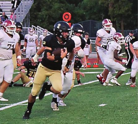 EXCELSIOR SPRINGS quarterback Chance Moreland heads toward the end zone for a touchdown during a Sept. 3 Missouri River Valley Conference West Division meeting with visiting Warrensburg. TIM HARLAN | Submitted Photo