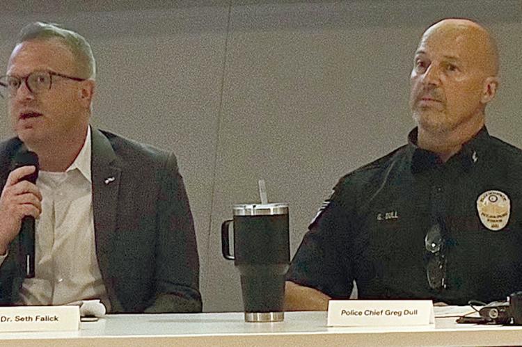 CRIMINAL JUSTICE PROFESSOR Dr. Seth Fallik (left) and Excelsior Springs Police Chief Greg Dull discuss automated license plate reader technology during a public forum on Flock cameras. MIRANDA JAMISON | Staff