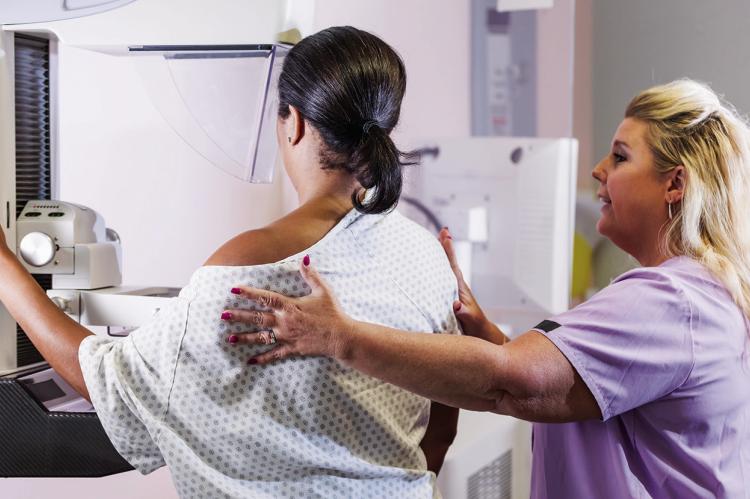 Breast health symposium aims to remove barriers to care