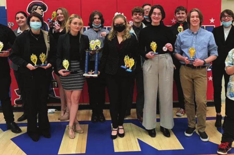 THE WINNING TEAM, from left, includes Ryan Dodd, Jena Redmon, Naomi Beissenherz, Jenna Hall, Tonya Sportsman, Brody Hurla, Isabella Selby, Isaiah Bruley, Sean Dimes, Emily Rice, Elijah Thomas, Jason Besherse, Aniston Kennedy and CeeJay Hardesty.