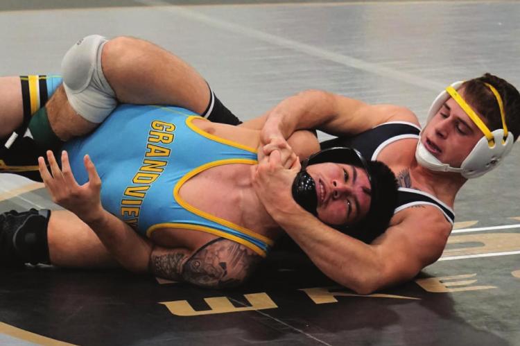 JUNIOR AYDEN DOLT, seen here earlier in the season, represents the Tigers in the 145-pound weight class this week at Class 2 state competition. DUSTIN DANNER | Staff