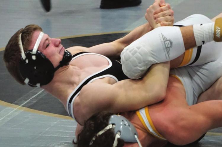 JUNIOR LANDEN DAVIS, seen here in sectional competition, represents the Tigers this week at 126 in the Class 2 state tournament.