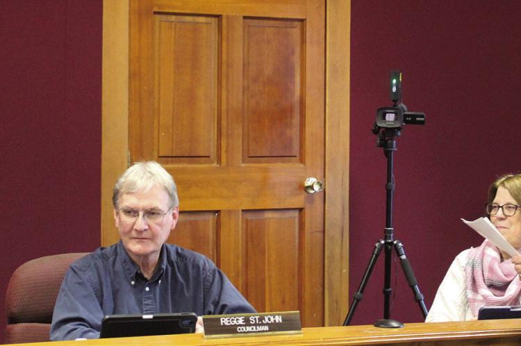 MARK SPOHN (left) is sworn in to the Excelsior Springs City Council following the April 8 election. MIRANDA JAMISON | Staff