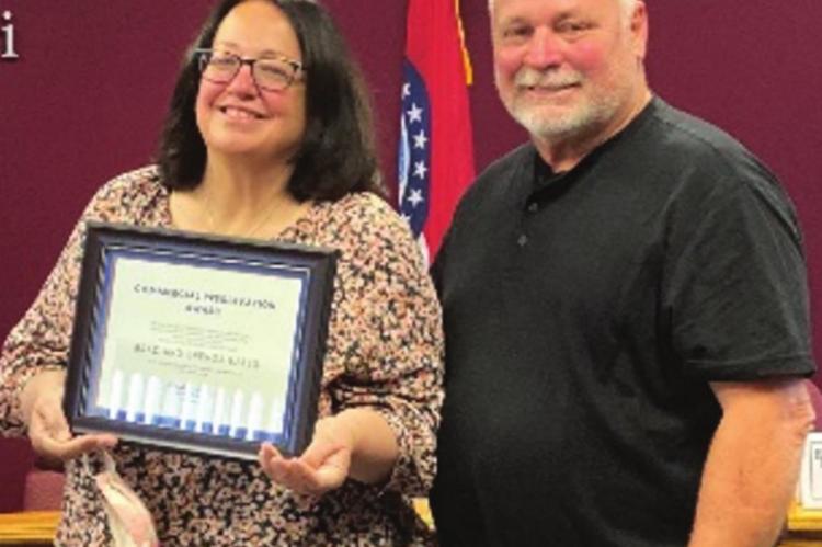 IN 2021, Brenda and Brad Eales receive the Historic Preservation Commission’s Commercial Property Award for their work to improve historic properties.
