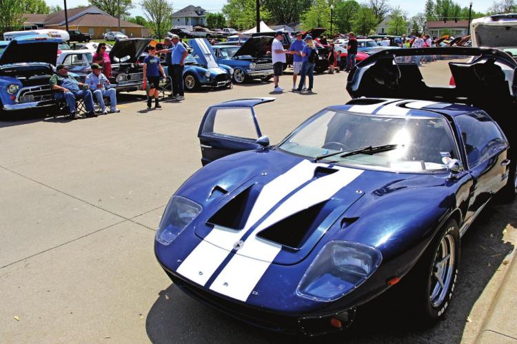 VINTAGE and modern vehicles drive guests to the car show during the 40th Annual Richmond Mushroom Festival in the municipal center parking lot. J.C. VENTIMIGLIA | Staff
