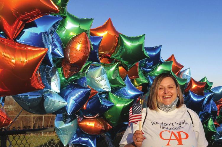 WITH FLAG in hand, Brandy Arnold is ready to walk.