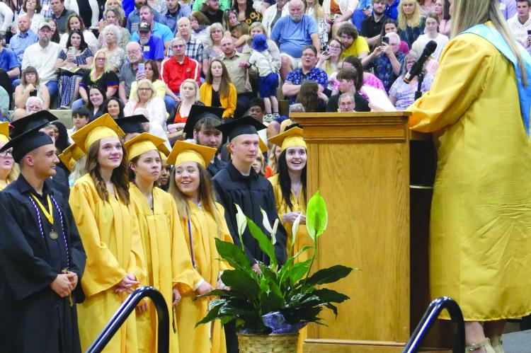 MATEYA FIGUEROA senior class representative sends her fellow classmates off with a final speech. ELIZABETH BARNT | Staff