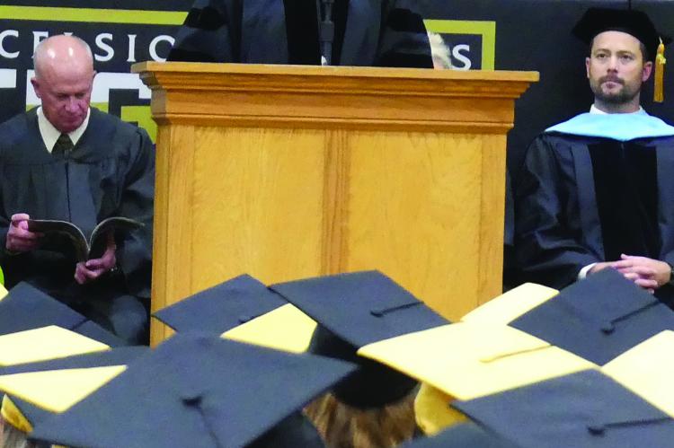 EXCELSIOR SPRINGS High School Principal Dr. Christen Everett speaks to graduates about their achievements.