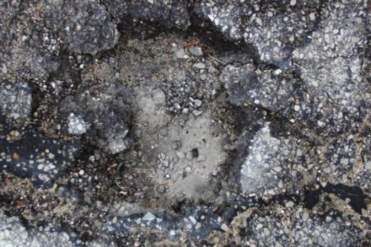 STREET WORK will address cracks like these.